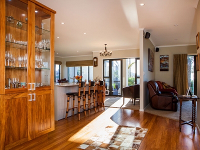 A view of the dining room and into the living | Home builders New Plymouth