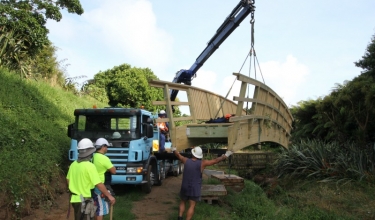 Craning the bridge into place | Builders Taranaki